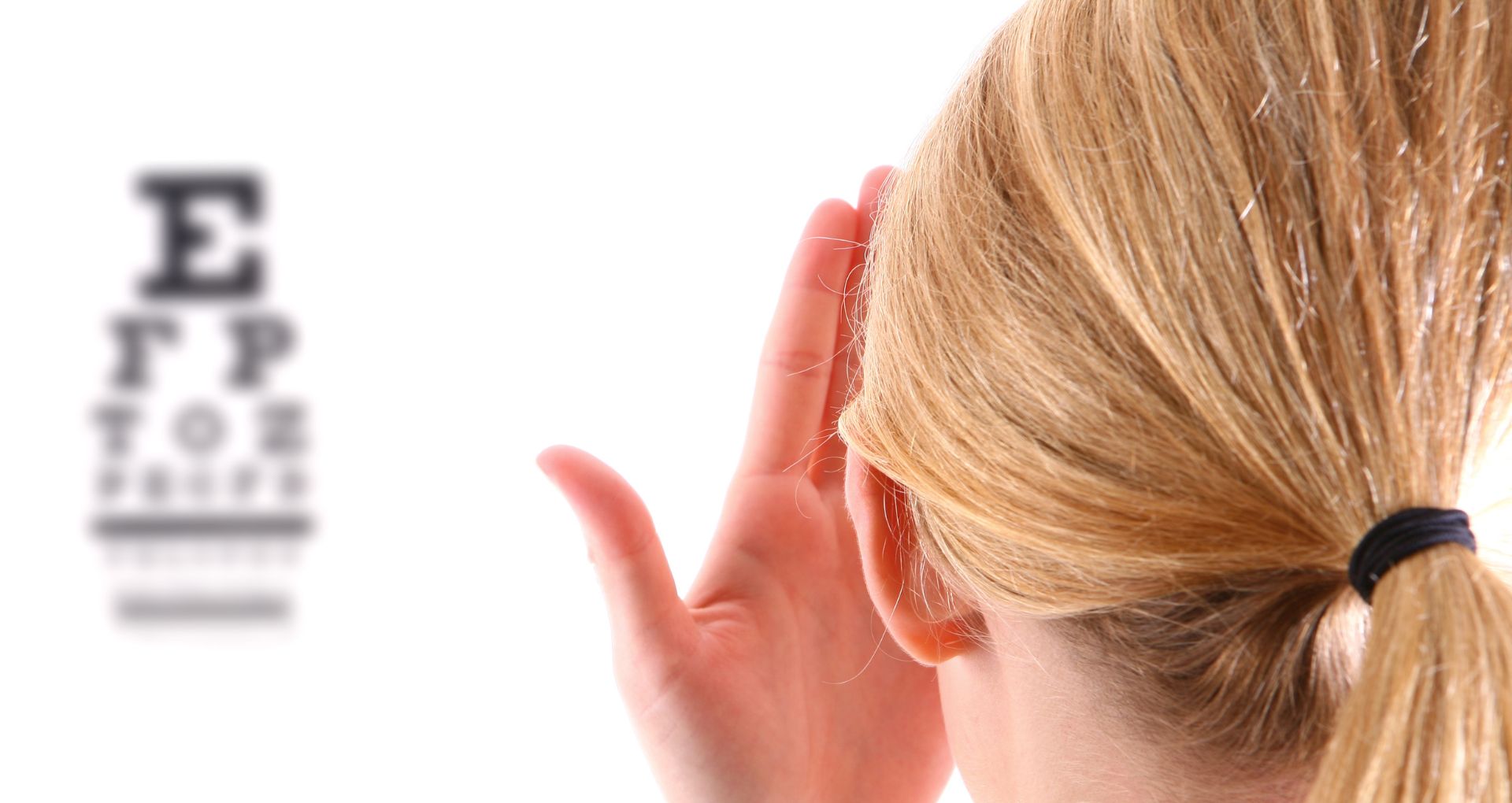 Woman having routine eye exam